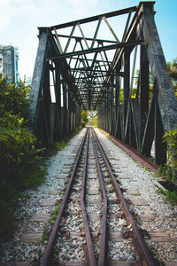 Railroad track along bridge