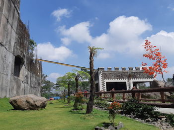 View of building against cloudy sky