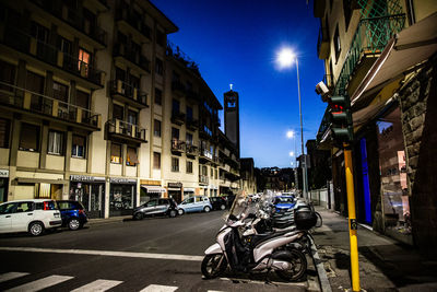 People walking on street at night