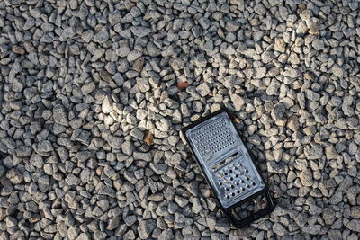 High angle view of stones on cobblestone street