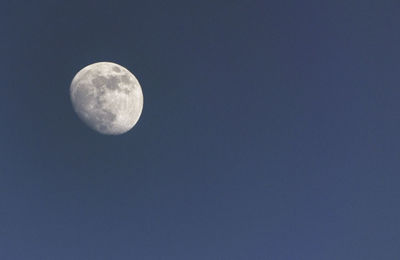 Low angle view of moon in sky