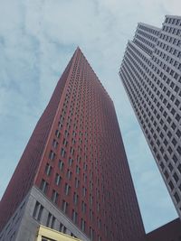 Low angle view of modern buildings against sky