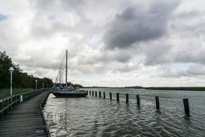 Bridge over river against sky