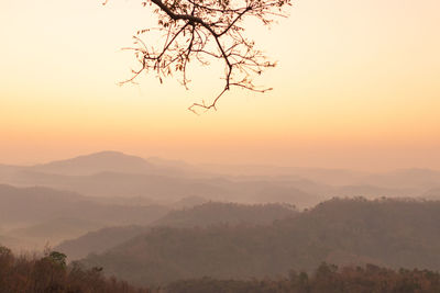 Scenic view of mountains against sky during sunset