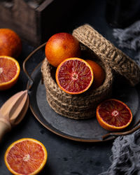 High angle view of orange fruits on table