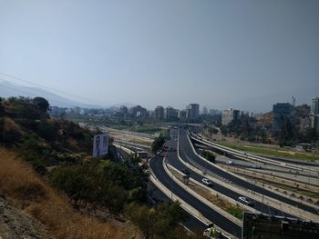 Aerial view of highway against clear sky