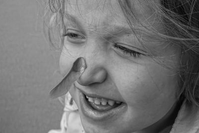 Close-up portrait of a smiling girl