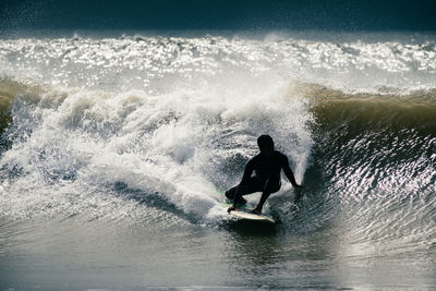 Man surfing in sea