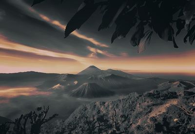 Scenic view of mountains against sky during sunset