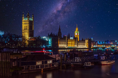 Illuminated buildings in city at night