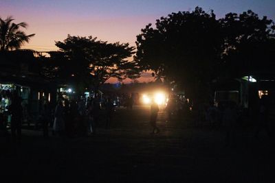 Silhouette of people at night