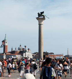 Group of people in front of historical building