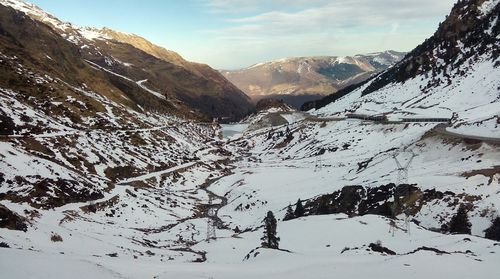 Scenic view of mountains against sky during winter