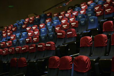 Row of empty chairs in cinema