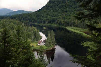 High angle view of trees and mountains against sky