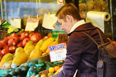 People at market stall