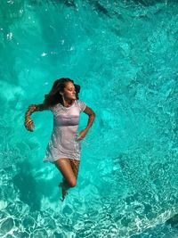 Directly above shot of woman in swimming pool