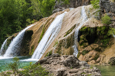 Scenic view of waterfall in forest