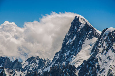 Snowy peaks and mountains, viewed from the aiguille du midi, near chamonix, in the french alps.