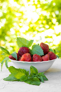 Close-up of strawberries in bowl on table