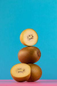 High angle view of apples on blue background