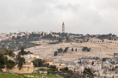 High angle view of buildings in city against sky