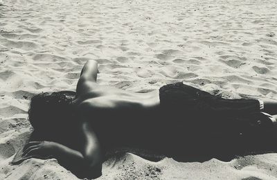 Two people relaxing on shore