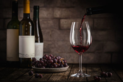Close-up of wineglasses on table