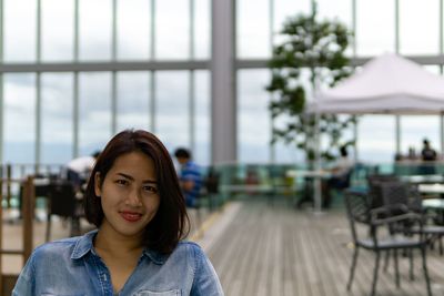 Portrait of a smiling young woman