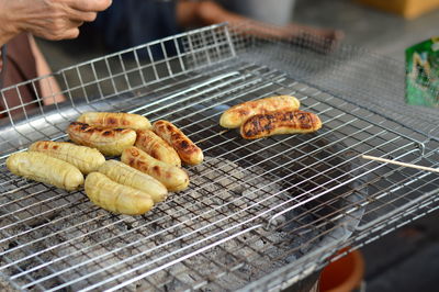 Close-up of meat on barbecue grill