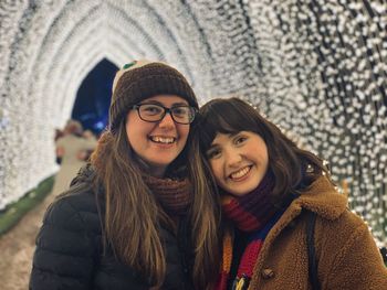 Portrait of smiling woman in snow