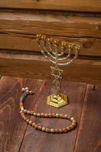 Close-up of pearl jewelry on table