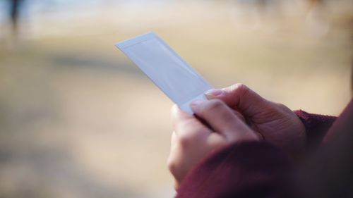 Close-up of person holding hands