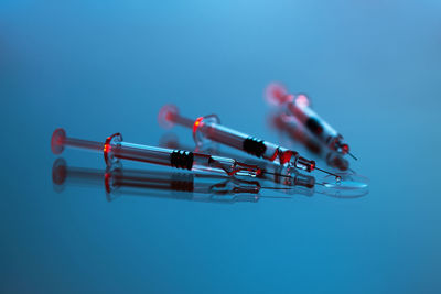 Syringes and tablets on white background, covid-19 corona virus vaccine and medicine