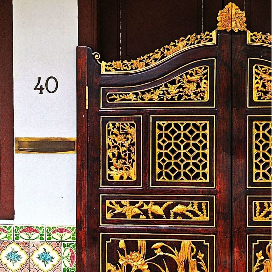 architecture, built structure, ornate, door, design, indoors, pattern, closed, entrance, art and craft, art, yellow, building exterior, carving - craft product, gold colored, creativity, no people, wall - building feature, wood - material, religion