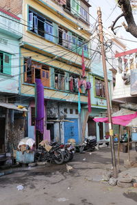 Houses by street in city