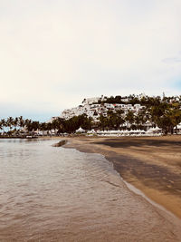 Scenic view of beach against sky