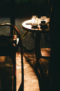 Low section of man standing on table