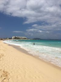 Scenic view of beach against sky