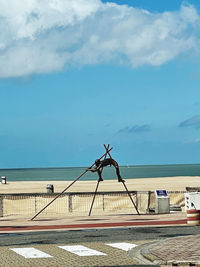 Scenic view of sea against blue sky