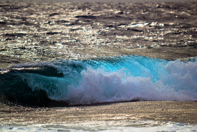 Sea waves splashing on shore