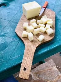 High angle view of chopped bread on cutting board