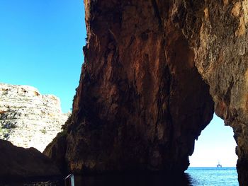 Scenic view of sea against blue sky