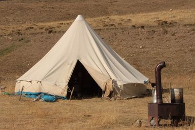 Tent on sand dune in desert
