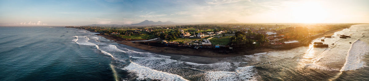 Panoramic view of bay against sky