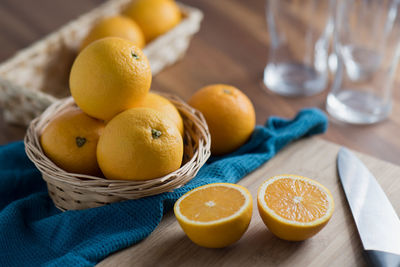 High angle view of fruits in basket on table