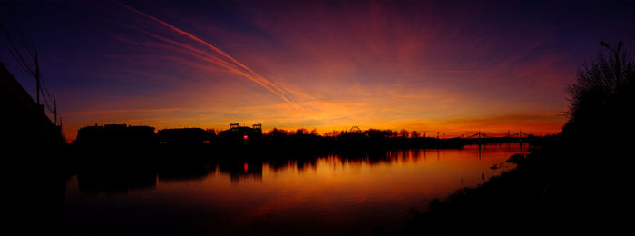 Scenic view of lake during sunset