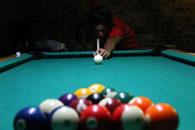 Man playing snooker