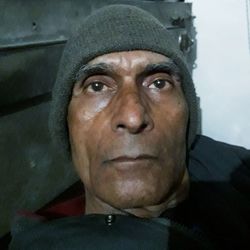 Portrait of man wearing hat