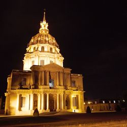 Illuminated cathedral against sky at night